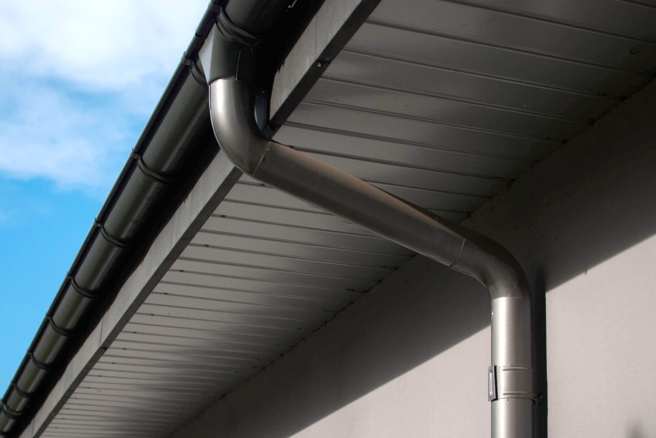 Corrosion-resistant galvanized gutters installed on a commercial building in St. Petersburg